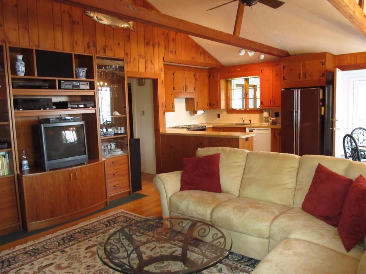 248 Pimlico Pond Road Mashpee, MA 02649 - Photo 13 of 22 a living room with stainless steel appliances furniture and a kitchen view