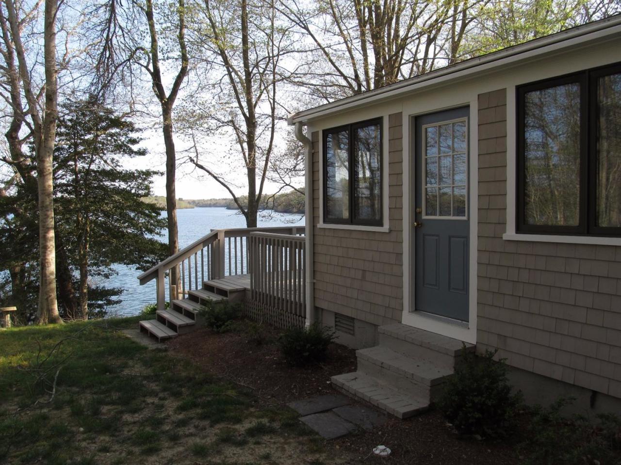 248 Pimlico Pond Road Mashpee, MA 02649 - Photo 9 of 22 a view of a house with a yard