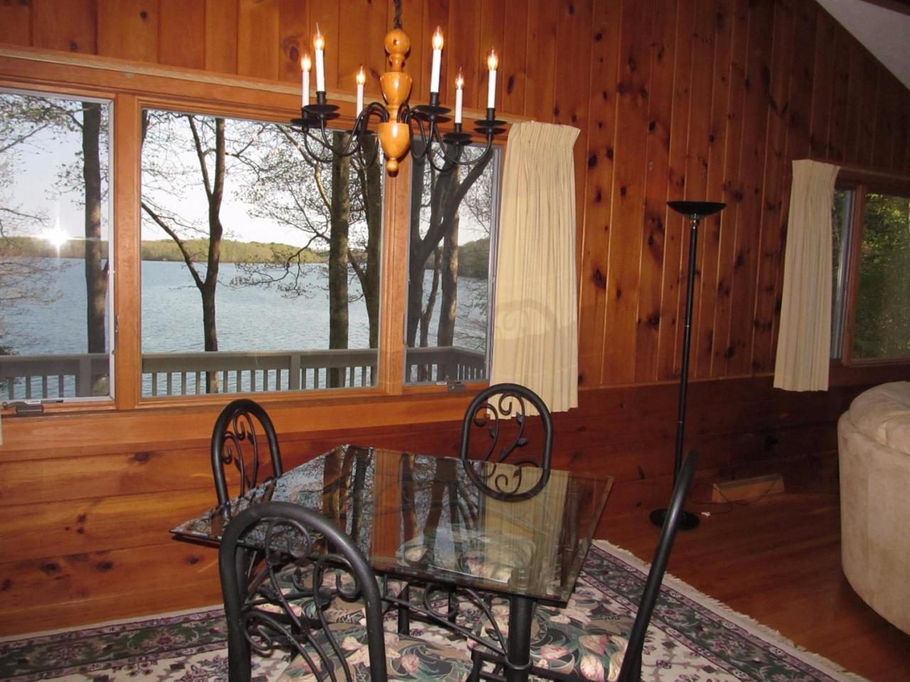 248 Pimlico Pond Road Mashpee, MA 02649 - Photo 10 of 22 a view of a table and chairs in patio