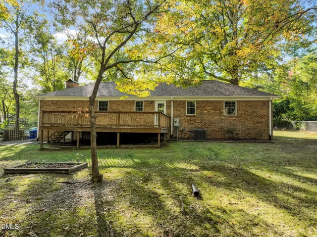 a view of a balcony with wooden floor