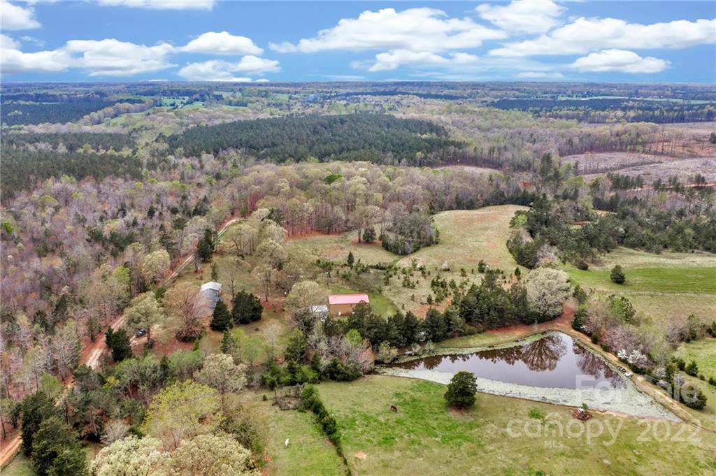 930 Stroupe Road Lancaster, SC 29720 - Photo 8 of 47 a view of a lake with a mountain