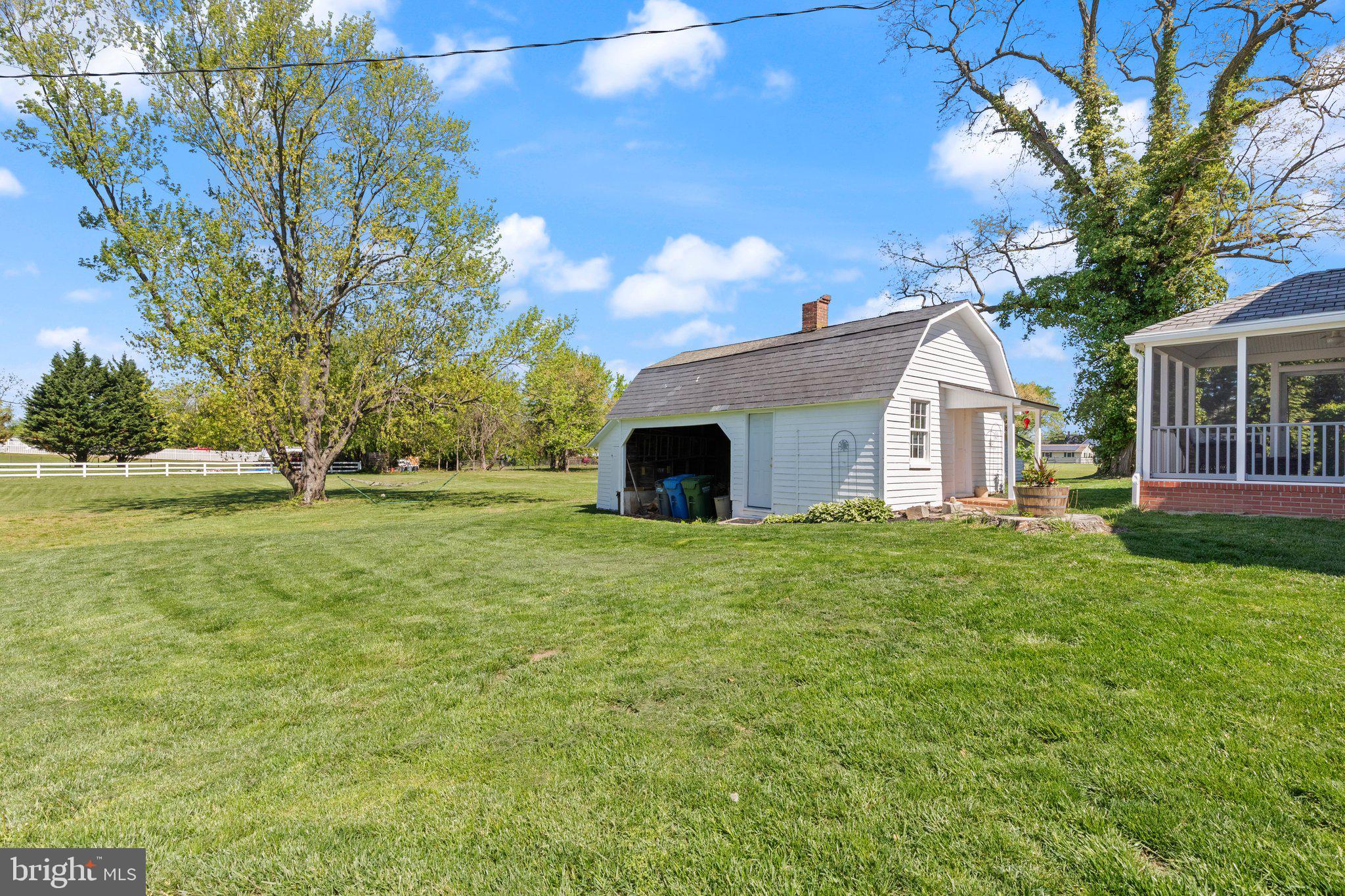 1604 Perryman Road Aberdeen, MD 21001 - Photo 44 of 57 a front view of house with yard and trees