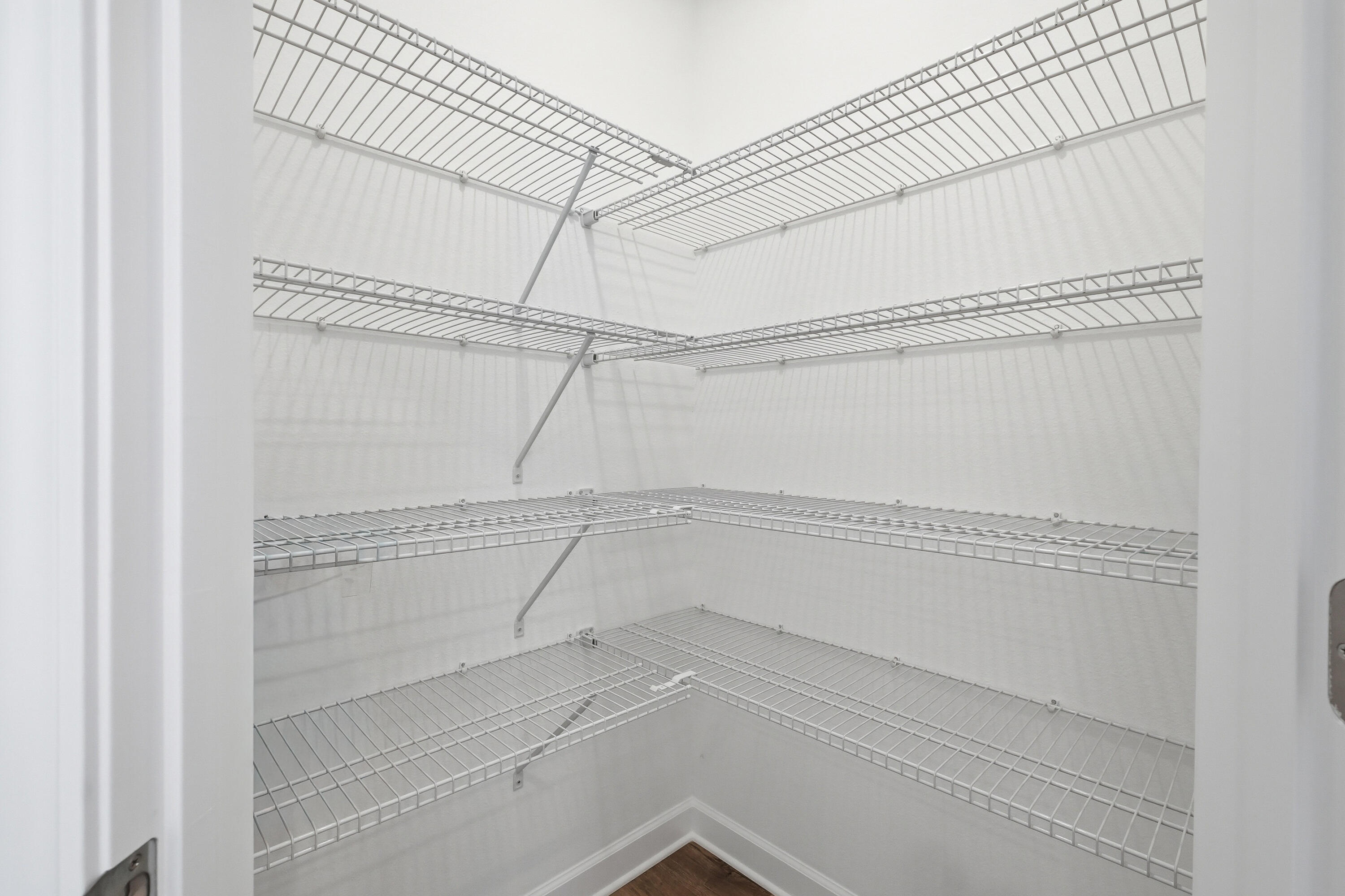 6138 Clover Street Crestview, FL 32539 - Photo 11 of 21 a view of a room with racks on the wall