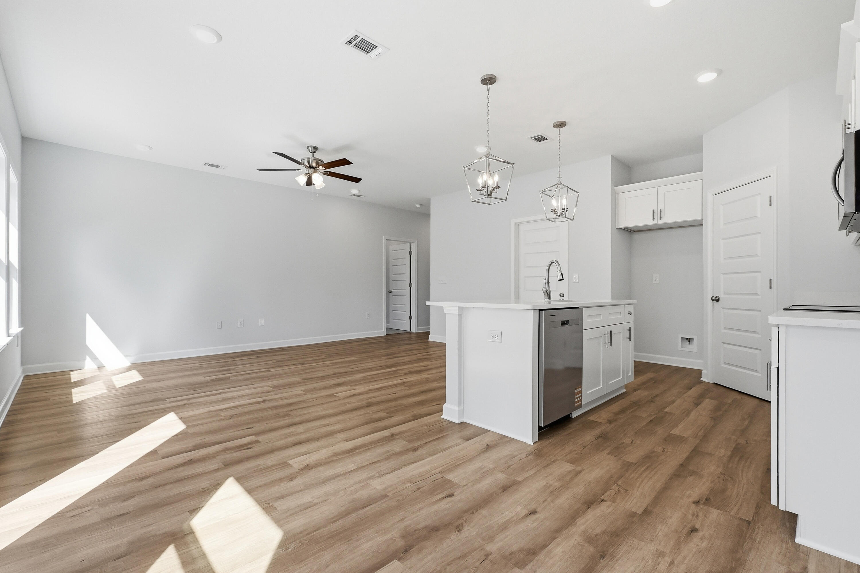 6138 Clover Street Crestview, FL 32539 - Photo 7 of 21 a view of a kitchen with wooden floor