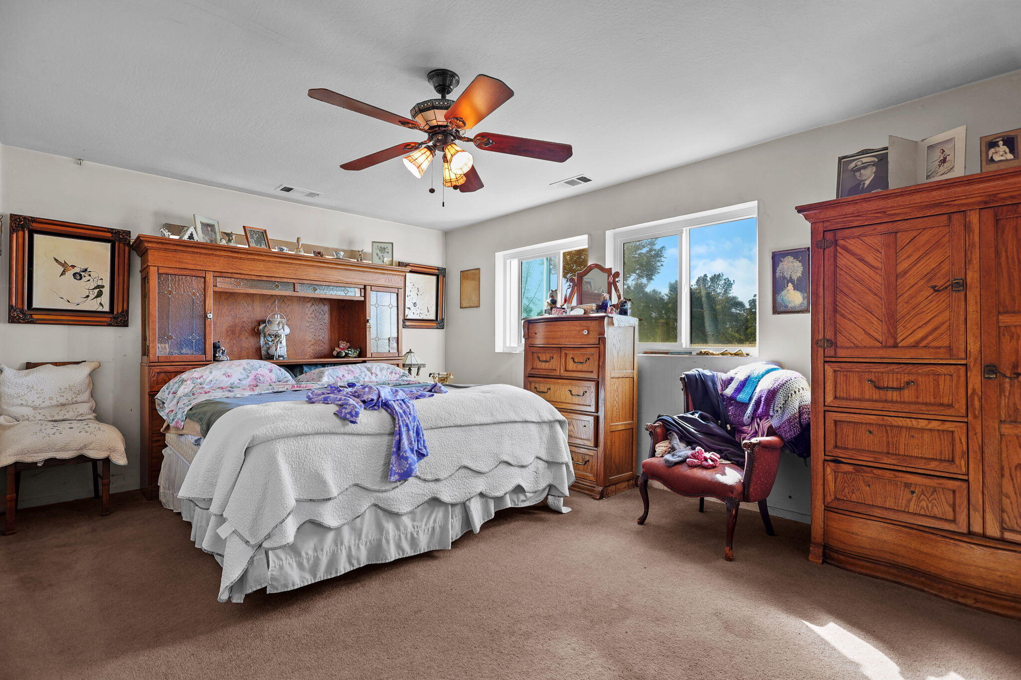15015 Highway 36, Unit WEST Red Bluff, CA 96080 - Photo 11 of 51 a bedroom with a bed and wooden floor