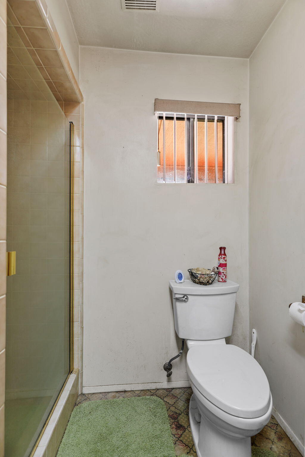 15015 Highway 36, Unit WEST Red Bluff, CA 96080 - Photo 18 of 51 a white toilet sitting next to a bathroom sink