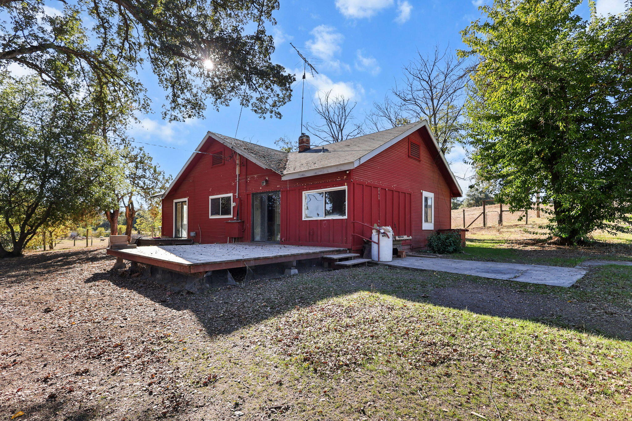 15015 Highway 36, Unit WEST Red Bluff, CA 96080 - Photo 20 of 51 a view of a house with a yard