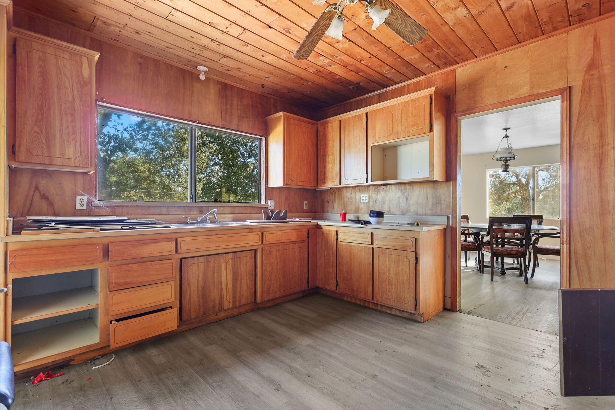 15015 Highway 36, Unit WEST Red Bluff, CA 96080 - Photo 24 of 51 a kitchen with sink cabinets and window