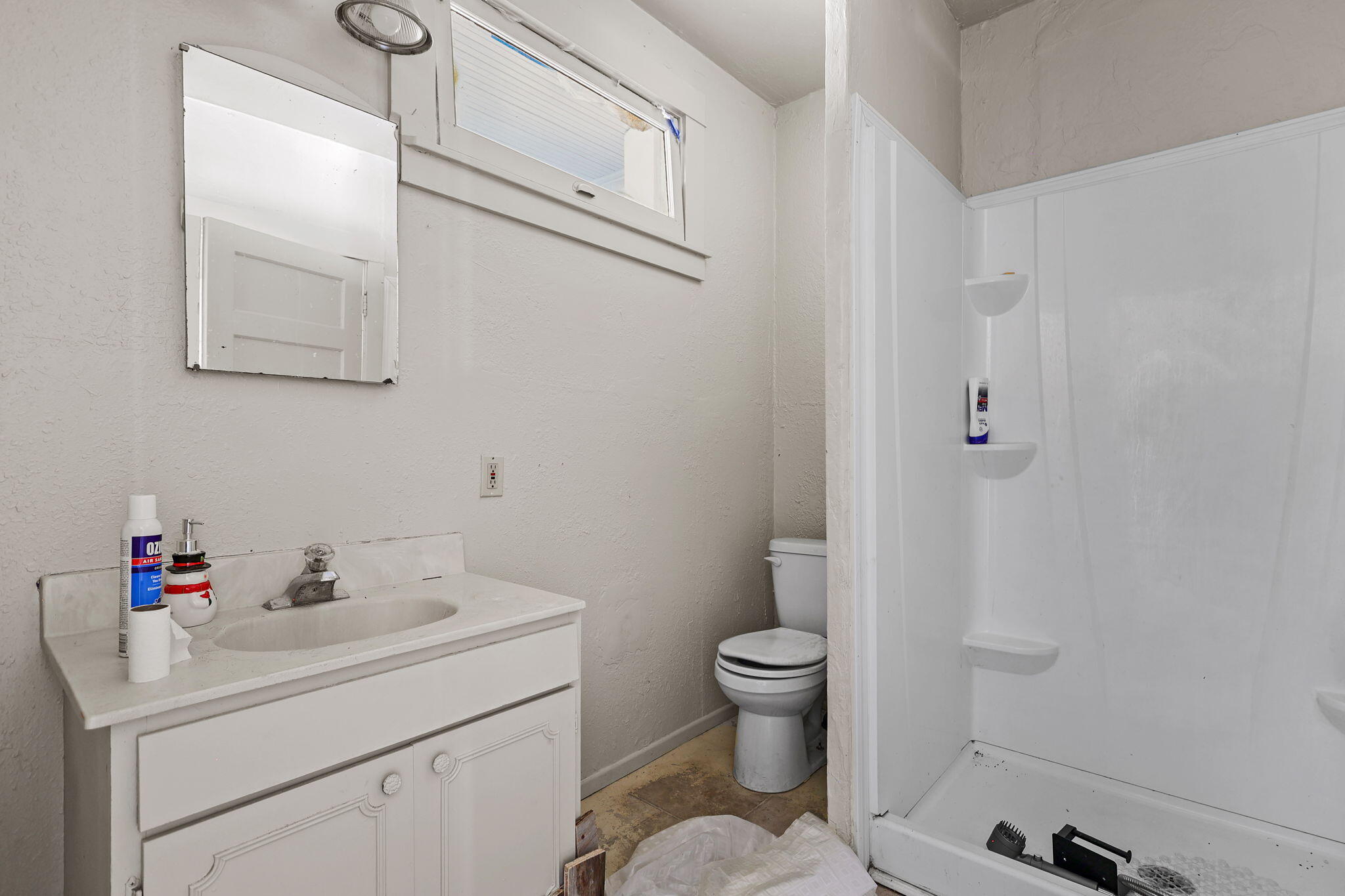 15015 Highway 36, Unit WEST Red Bluff, CA 96080 - Photo 29 of 51 a bathroom with a sink toilet and vanity