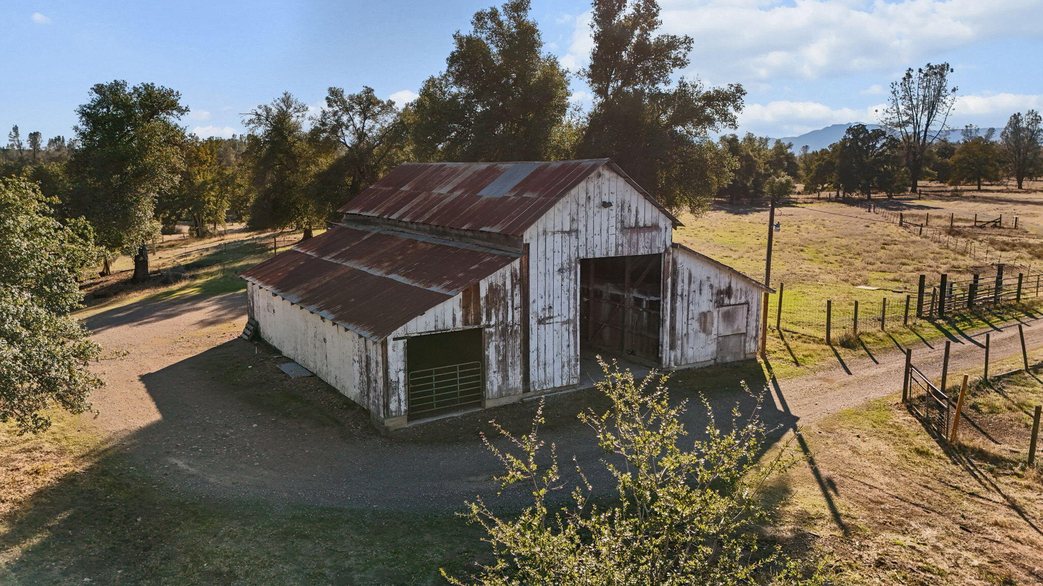 15015 Highway 36, Unit WEST Red Bluff, CA 96080 - Photo 3 of 51 a view of a house with a yard