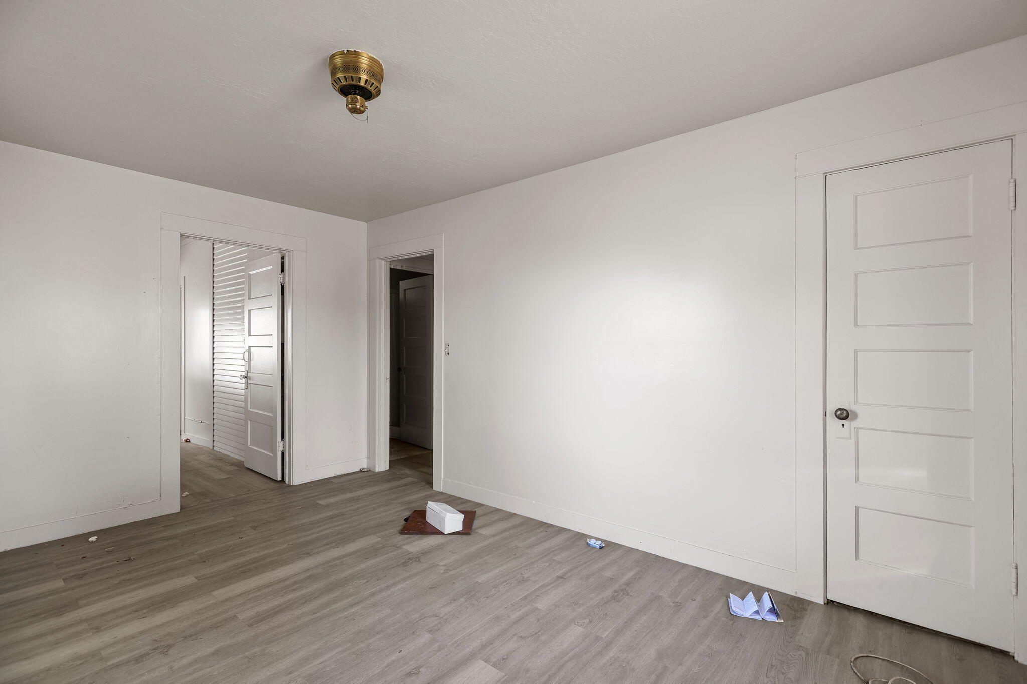 15015 Highway 36, Unit WEST Red Bluff, CA 96080 - Photo 33 of 51 an empty room with wooden floor and windows