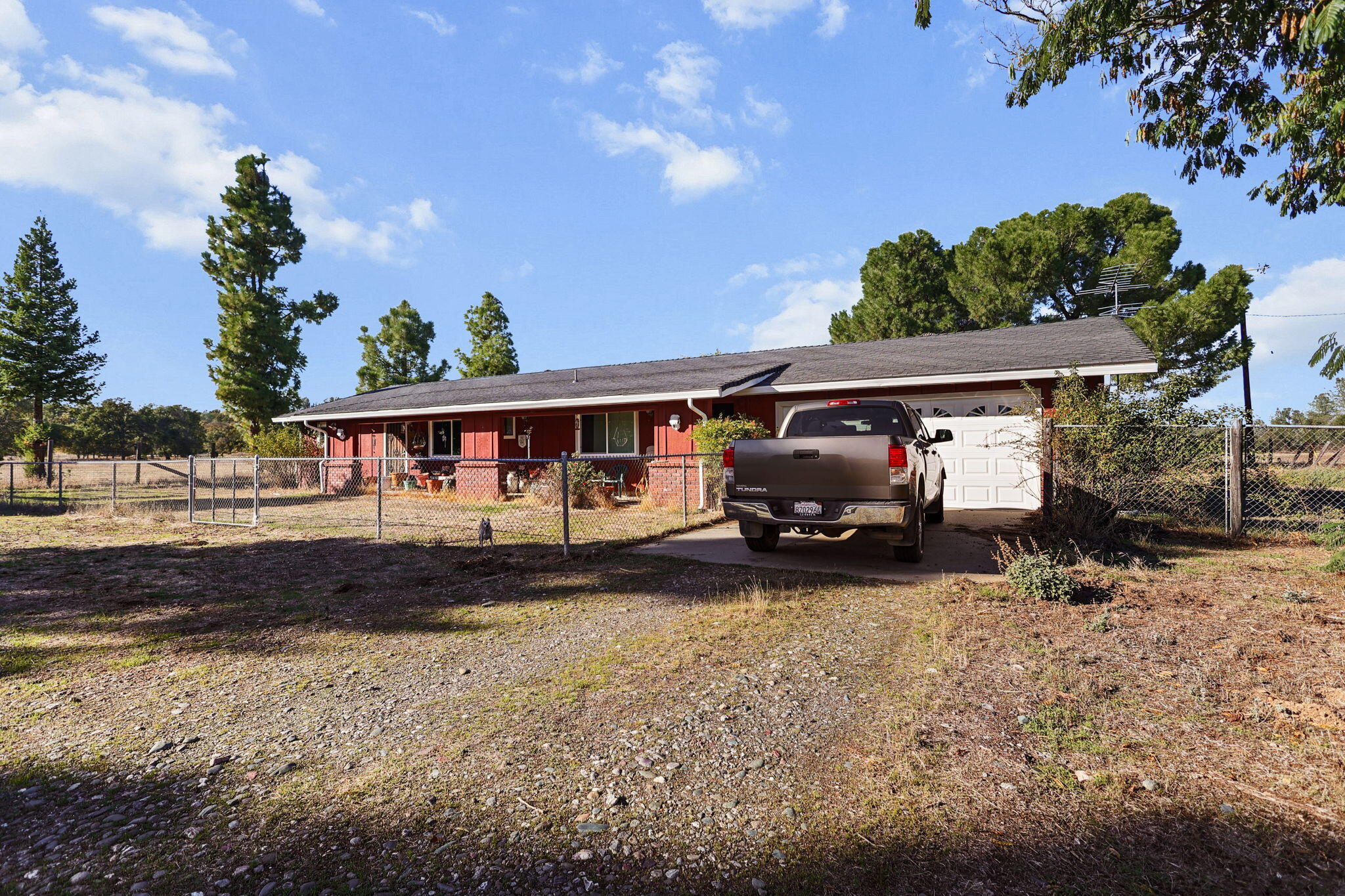 15015 Highway 36, Unit WEST Red Bluff, CA 96080 - Photo 44 of 51 a view of a house with a big yard