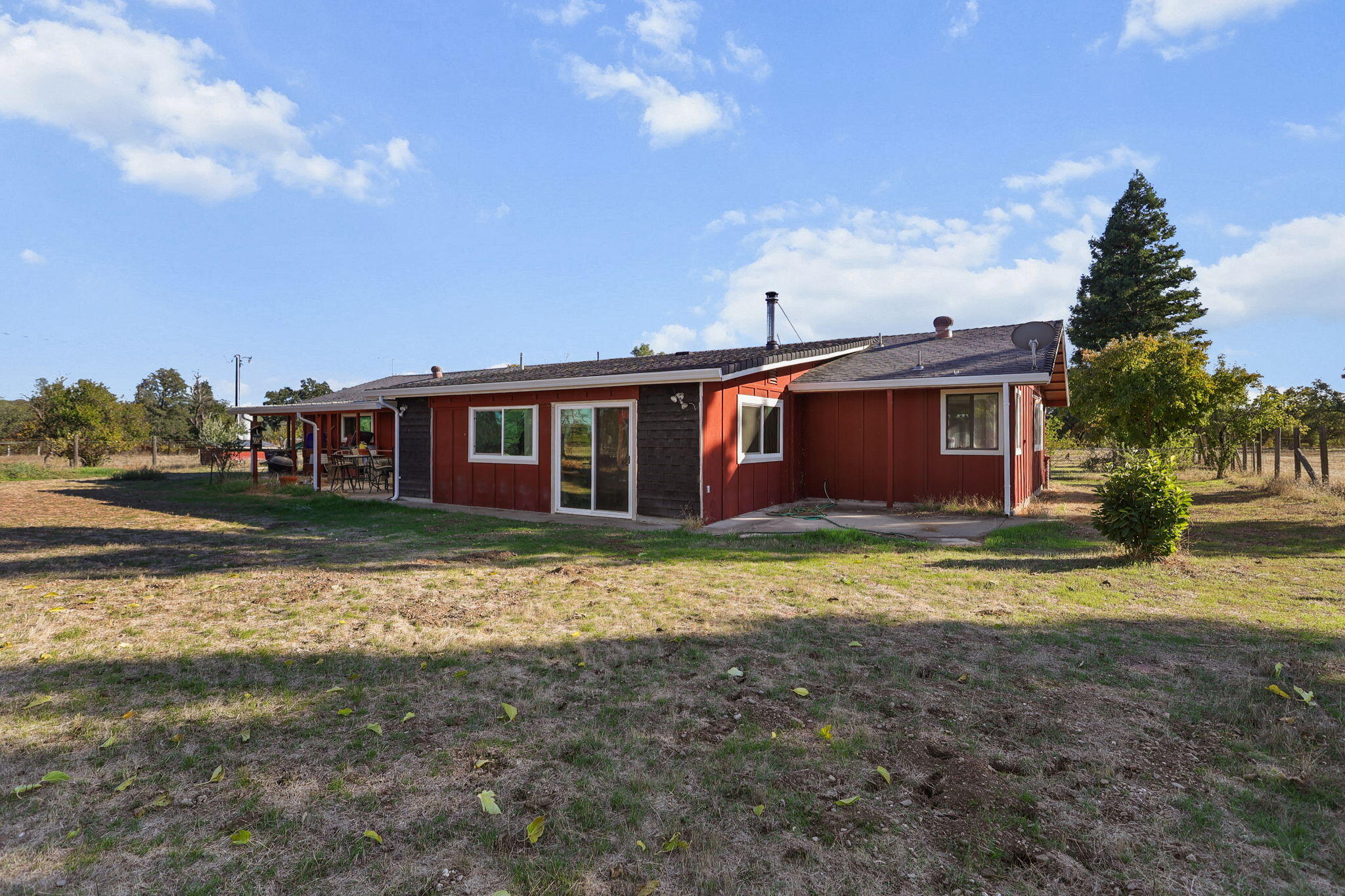 15015 Highway 36, Unit WEST Red Bluff, CA 96080 - Photo 46 of 51 a view of a house with a yard