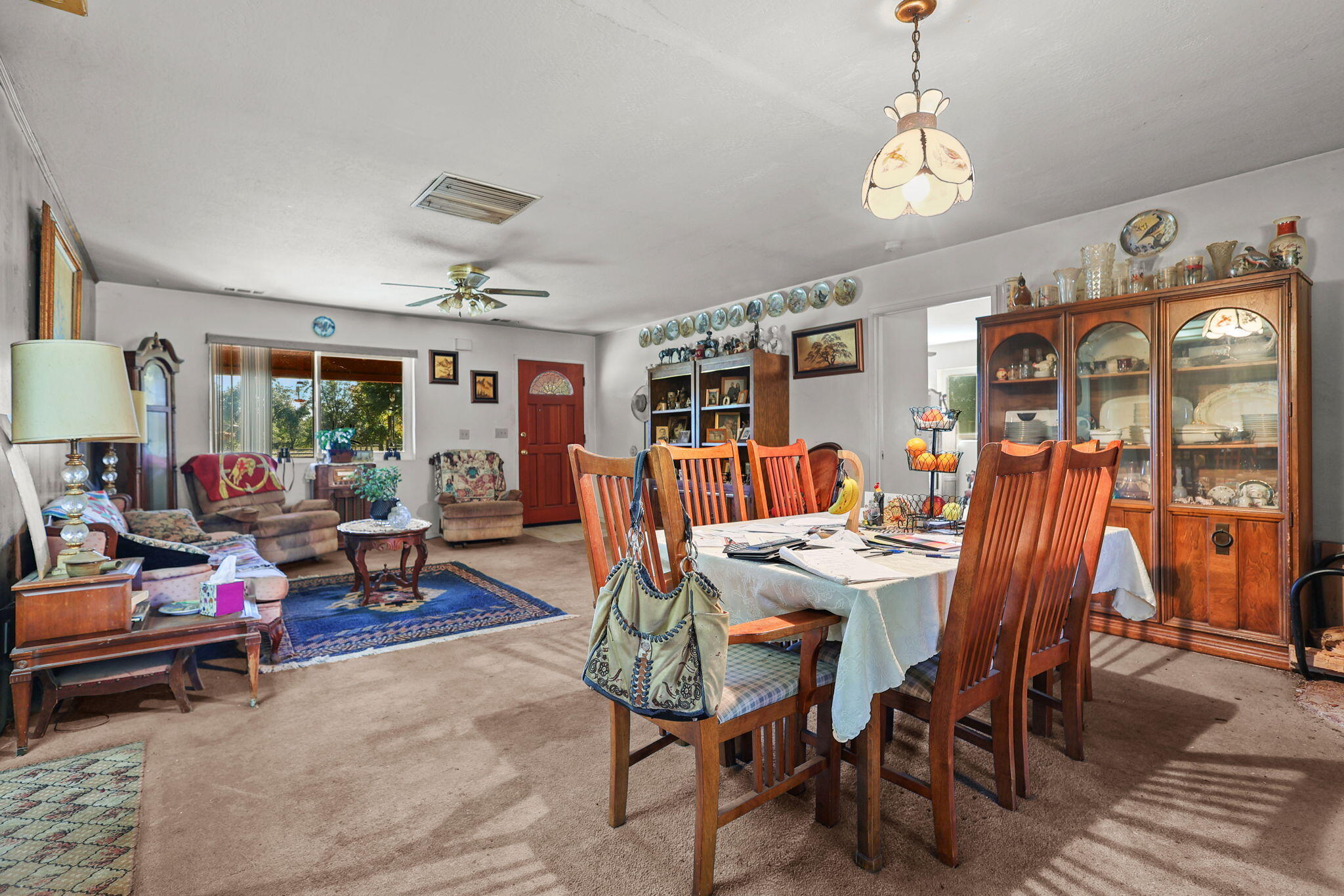 15015 Highway 36, Unit WEST Red Bluff, CA 96080 - Photo 7 of 51 a outdoor living space with furniture and a chandelier