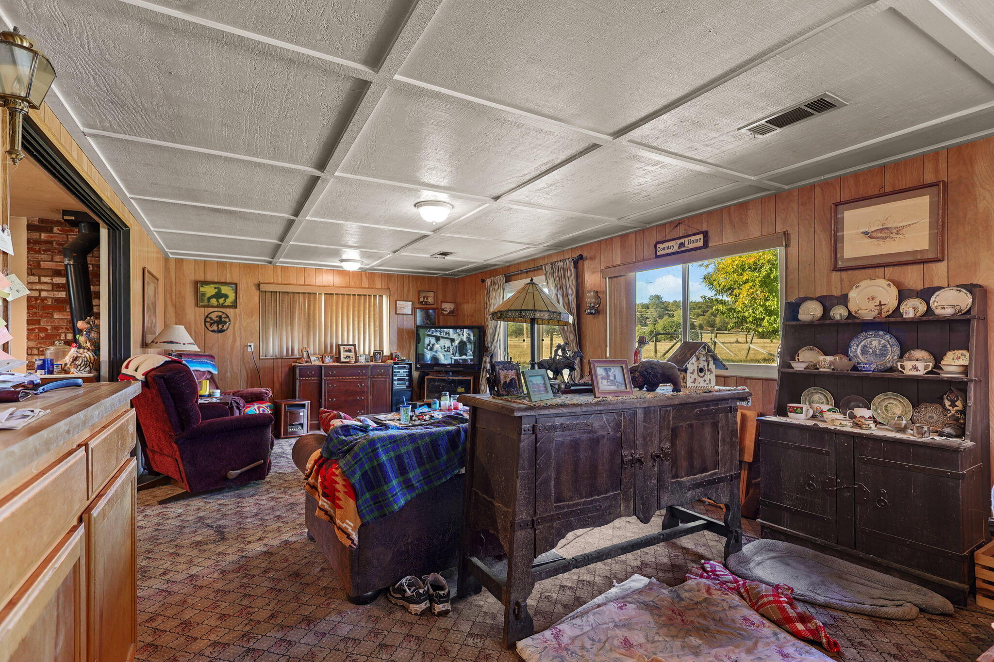 15015 Highway 36, Unit WEST Red Bluff, CA 96080 - Photo 10 of 51 a room with lots of furniture and a large window