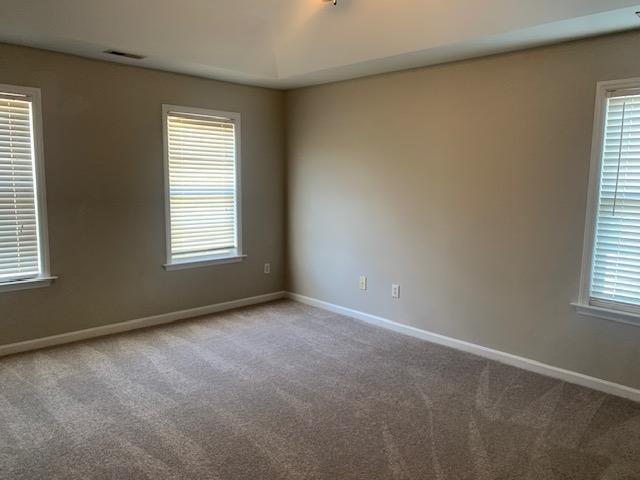 8320 Hobhouse Circle Raleigh, NC 27615 - Photo 13 of 16 an empty room with windows
