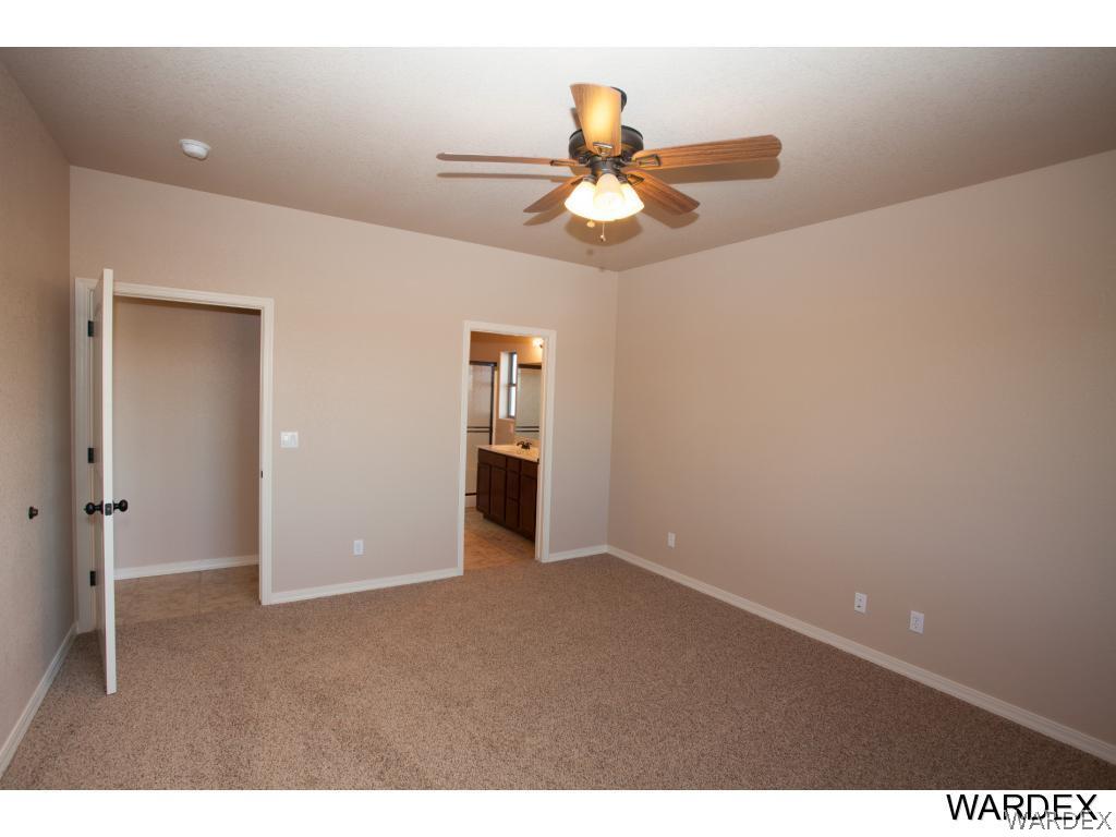 4830 North Neal Ranch Road Kingman, AZ 86401 - Photo 12 of 13 a view of an empty room