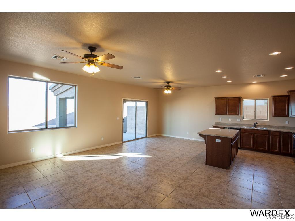 4830 North Neal Ranch Road Kingman, AZ 86401 - Photo 4 of 13 a view of an kitchen and a chandelier