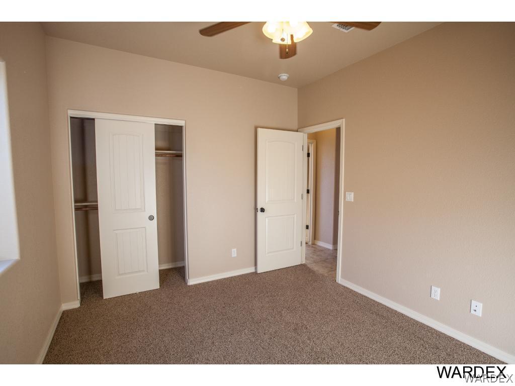 4830 North Neal Ranch Road Kingman, AZ 86401 - Photo 9 of 13 a view of an empty room