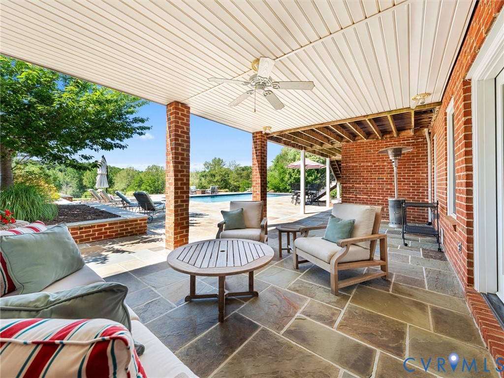1887 Sheppard Town Road Crozier, VA 23039 - Photo 57 of 98 Lower Level Covered Patio