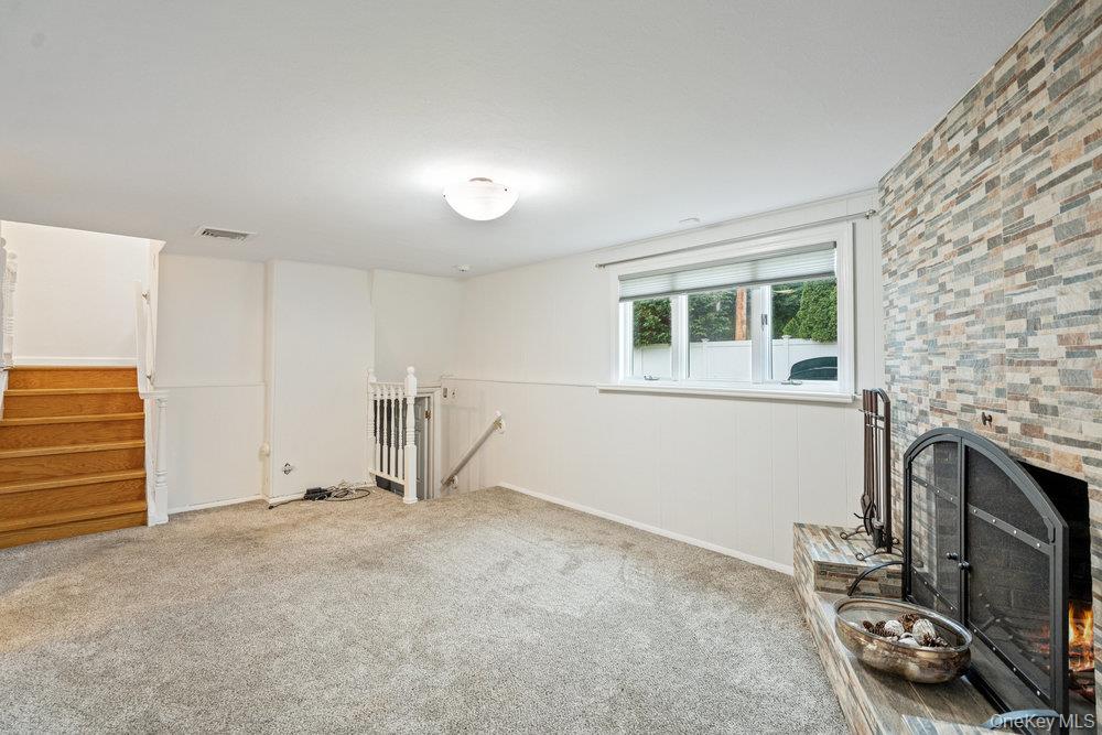 15 Morris Drive Syosset, NY 11791 - Photo 18 of 32 a view of livingroom with furniture and windows