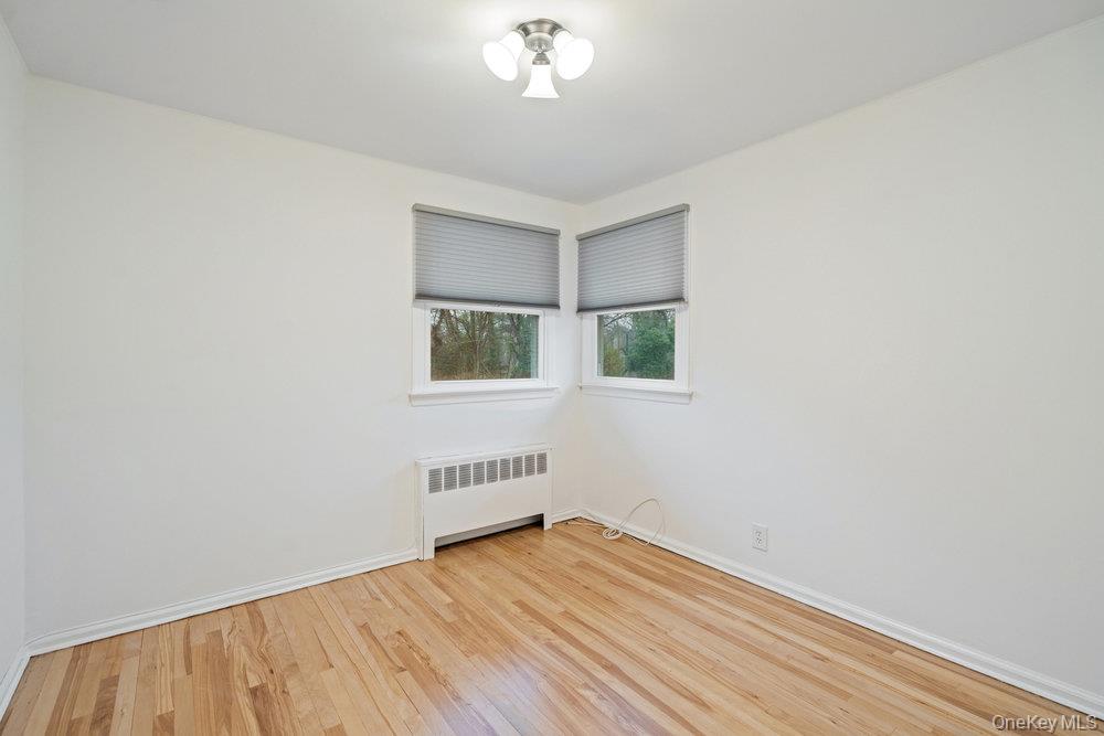 15 Morris Drive Syosset, NY 11791 - Photo 23 of 32 an empty room with a window