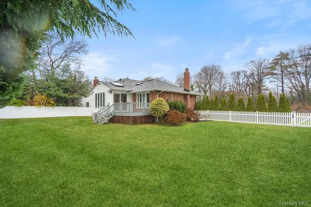 a view of a house with a big yard