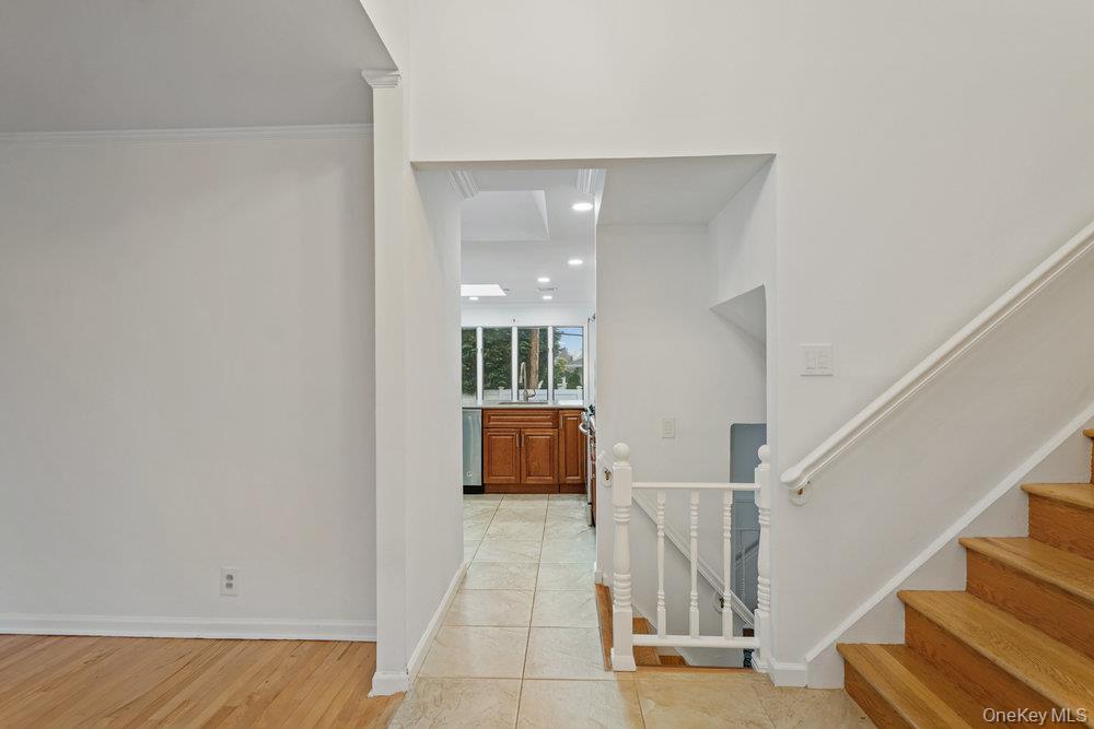 15 Morris Drive Syosset, NY 11791 - Photo 4 of 32 a view of entryway and hall with wooden floor