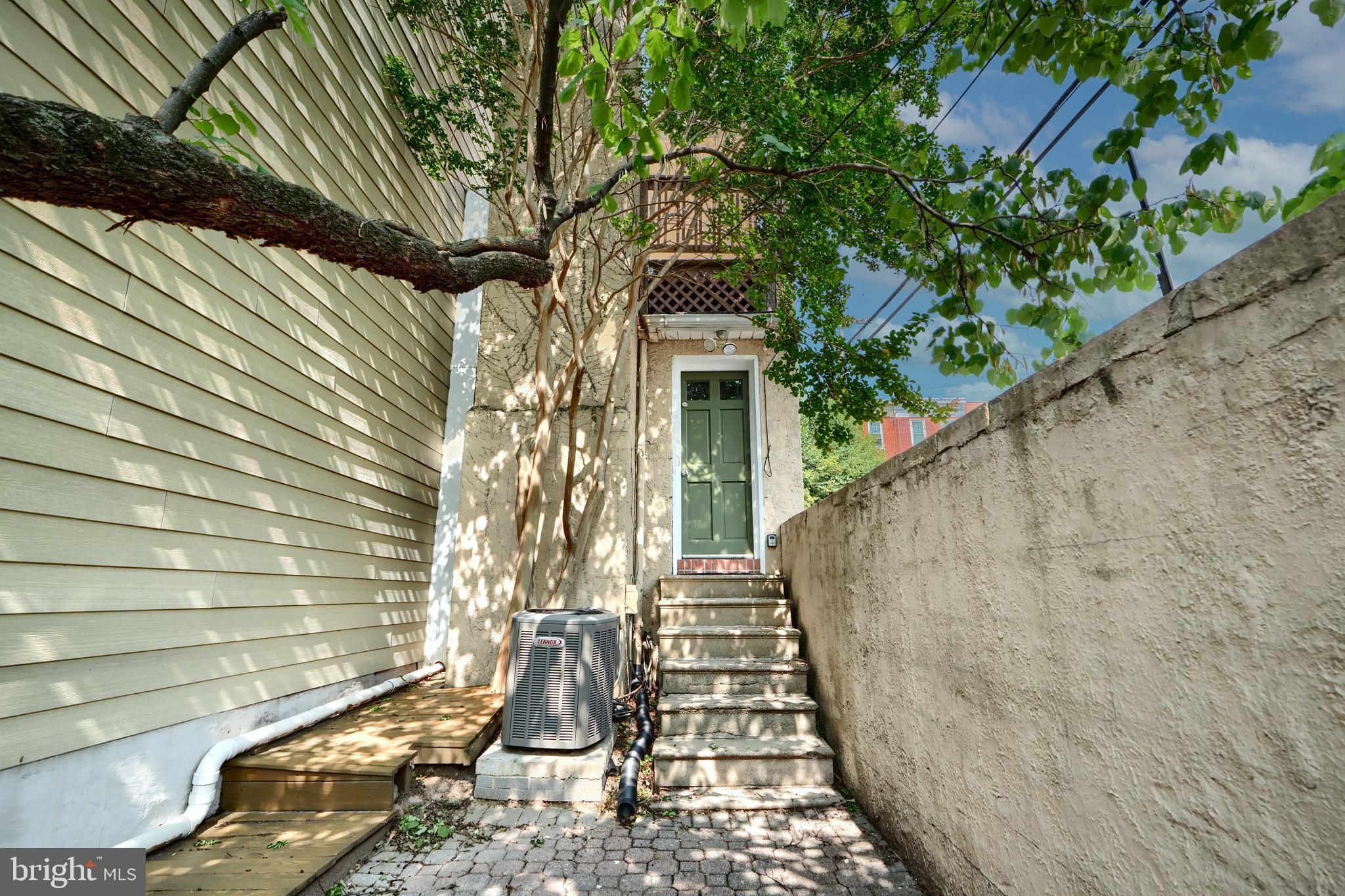 1142 Riverside Avenue Baltimore, MD 21230 - Photo 16 of 41 a view of a house with a yard