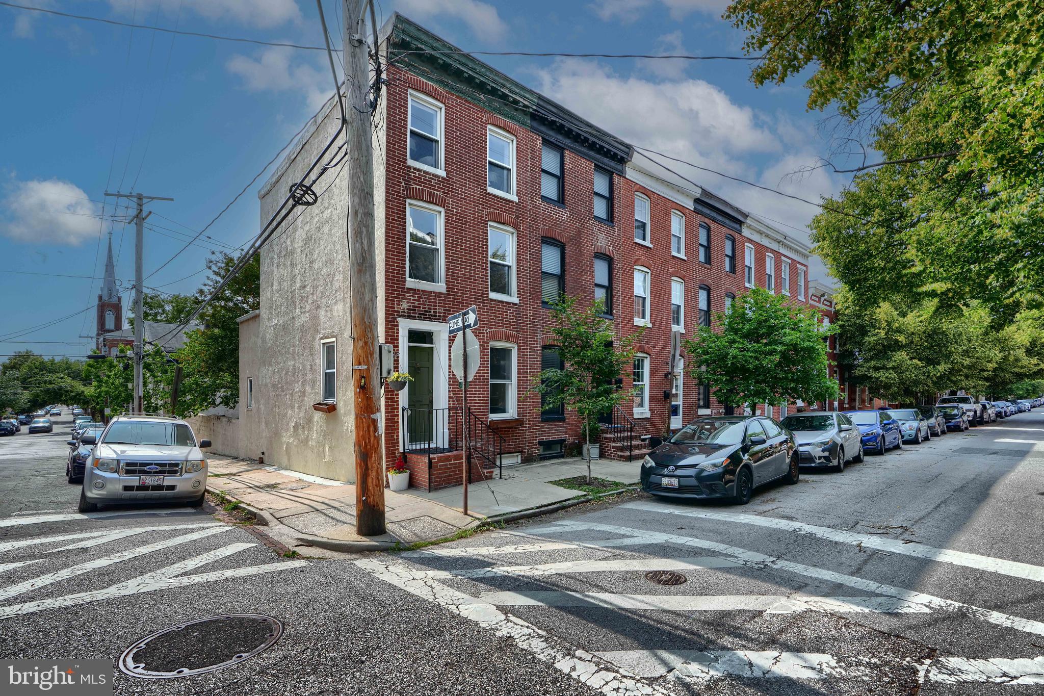 1142 Riverside Avenue Baltimore, MD 21230 - Photo 2 of 41 a view of a street with cars