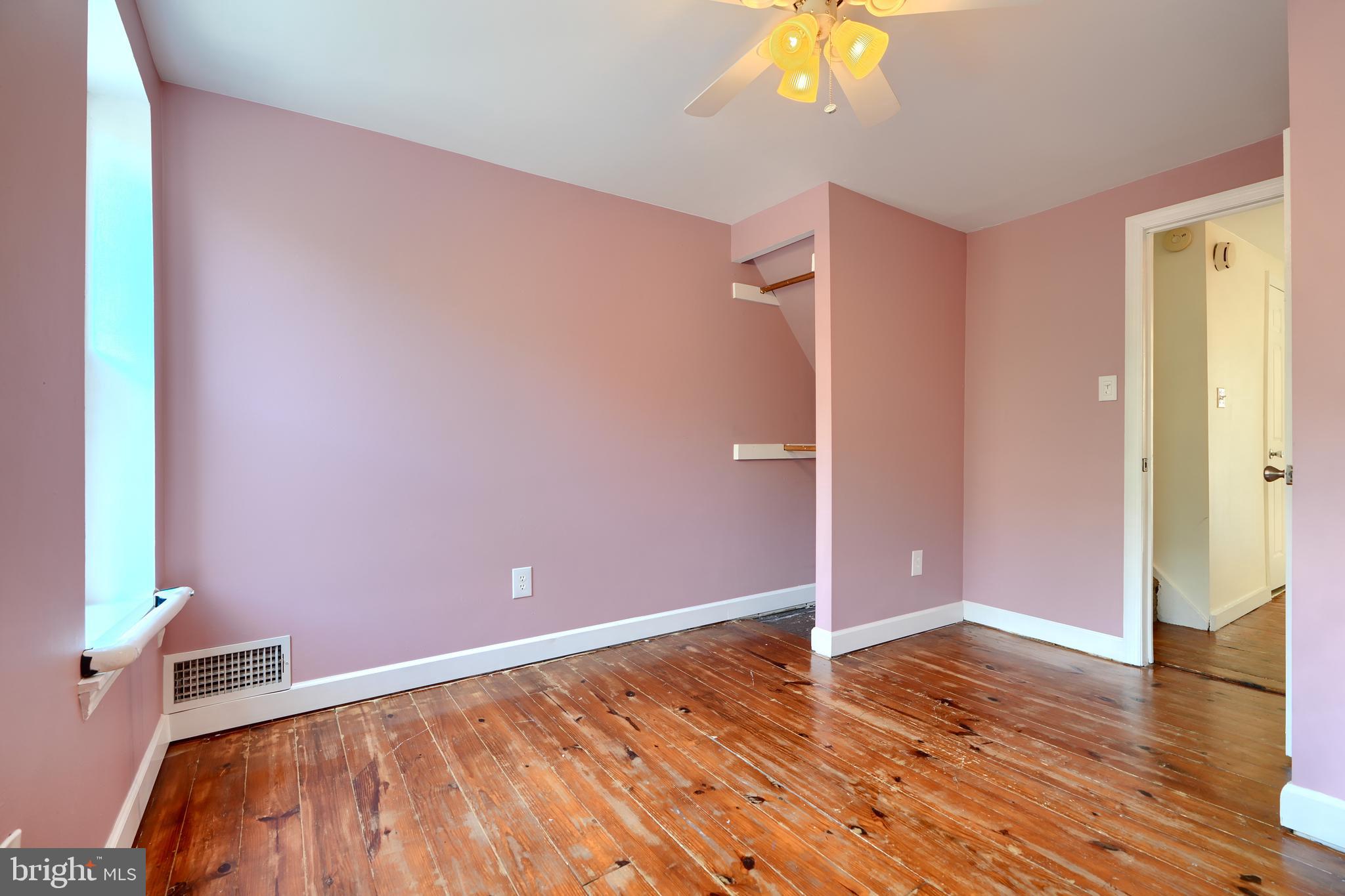 1142 Riverside Avenue Baltimore, MD 21230 - Photo 27 of 41 a view of empty room with wooden floor