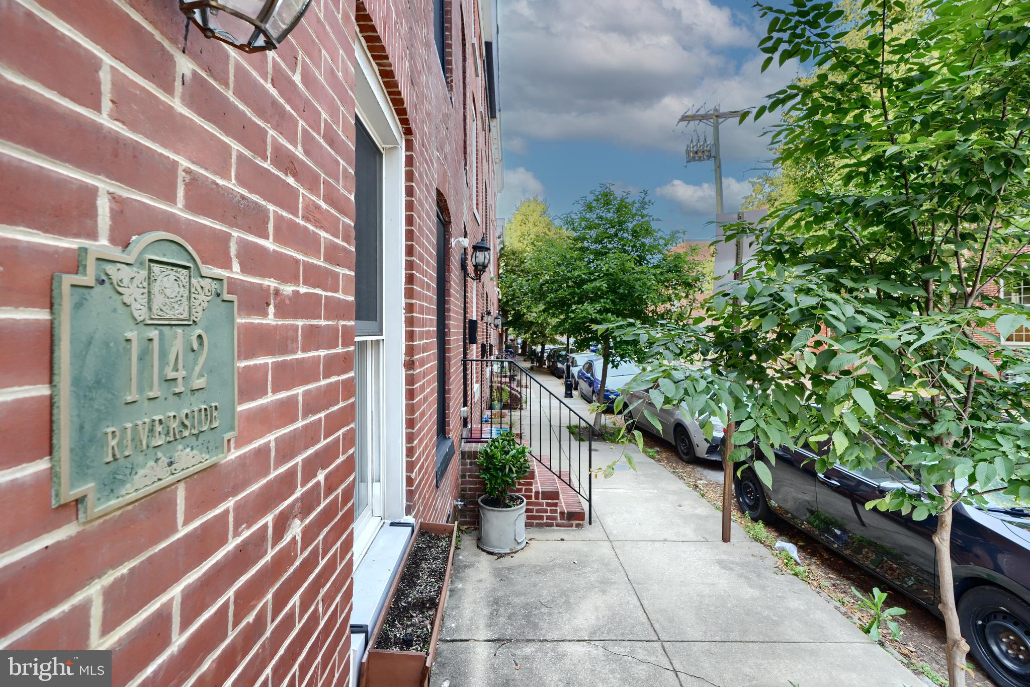 1142 Riverside Avenue Baltimore, MD 21230 - Photo 4 of 41 a view of a pathway both side of building