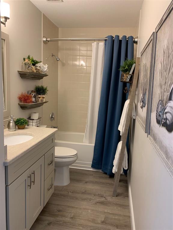 8411 Placida Road, Unit 205 Placida, FL 33946 - Photo 11 of 51 a bathroom with a sink a toilet and shower