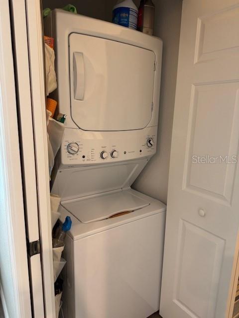 8411 Placida Road, Unit 205 Placida, FL 33946 - Photo 13 of 51 a utility room with dryer and washer
