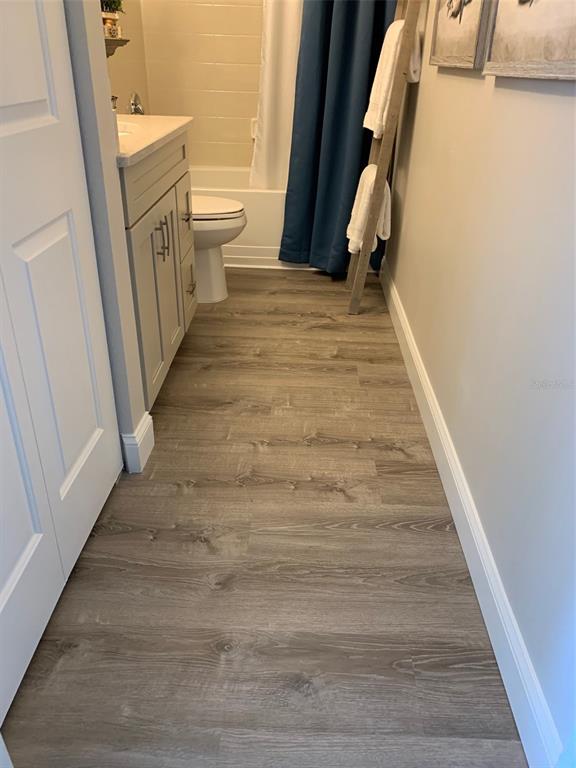 8411 Placida Road, Unit 205 Placida, FL 33946 - Photo 29 of 51 a bathroom with a sink and a toilet