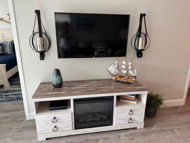 8411 Placida Road, Unit 205 Placida, FL 33946 - Photo 32 of 51 a kitchen with stainless steel appliances granite countertop a sink and cabinets