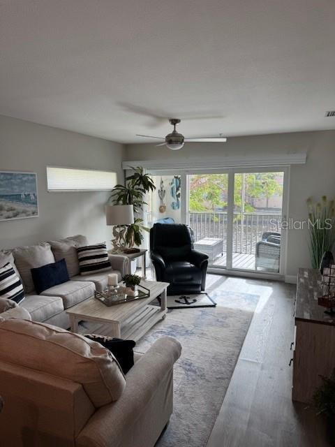 8411 Placida Road, Unit 205 Placida, FL 33946 - Photo 35 of 51 a living room with furniture and a large window