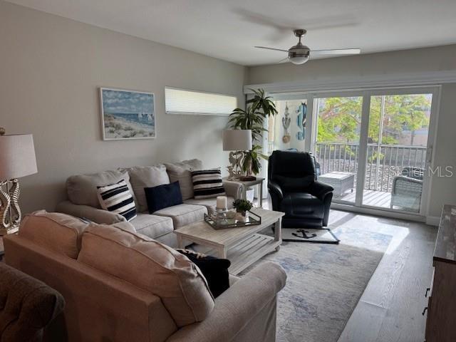 8411 Placida Road, Unit 205 Placida, FL 33946 - Photo 36 of 51 a living room with furniture and a large window