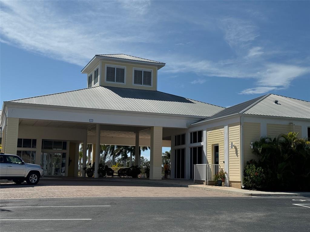 8411 Placida Road, Unit 205 Placida, FL 33946 - Photo 39 of 51 a view of a building with a outdoor space