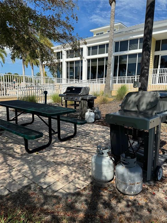 8411 Placida Road, Unit 205 Placida, FL 33946 - Photo 46 of 51 a view of a house with backyard and sitting area