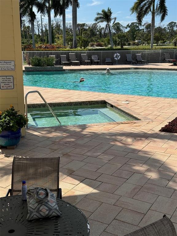 8411 Placida Road, Unit 205 Placida, FL 33946 - Photo 47 of 51 a view of a garden with an outdoor space