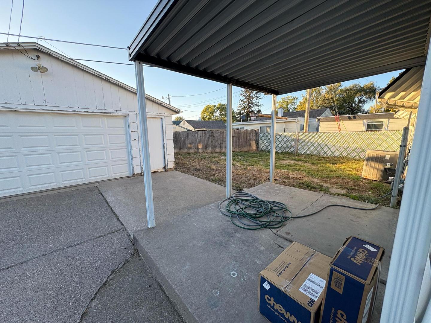 1003 41st Street Moline, IL 61265 - Photo 13 of 17 a view of a chairs and table in the patio