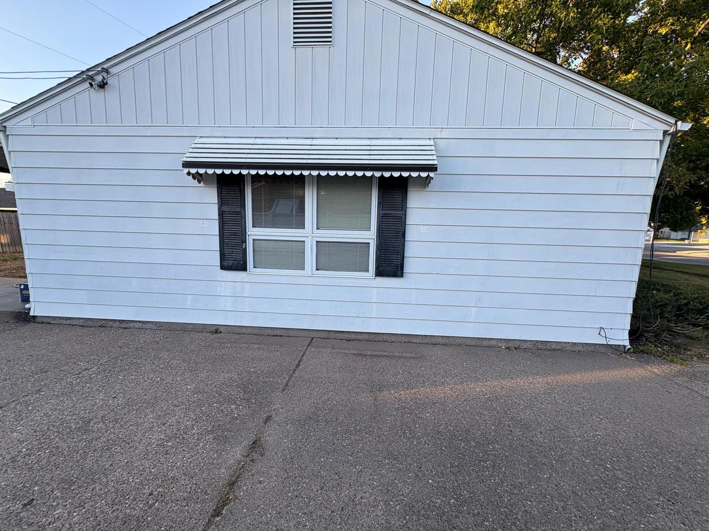 1003 41st Street Moline, IL 61265 - Photo 15 of 17 a front view of a house with garage