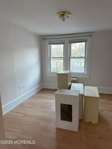 a view of livingroom with furniture and window