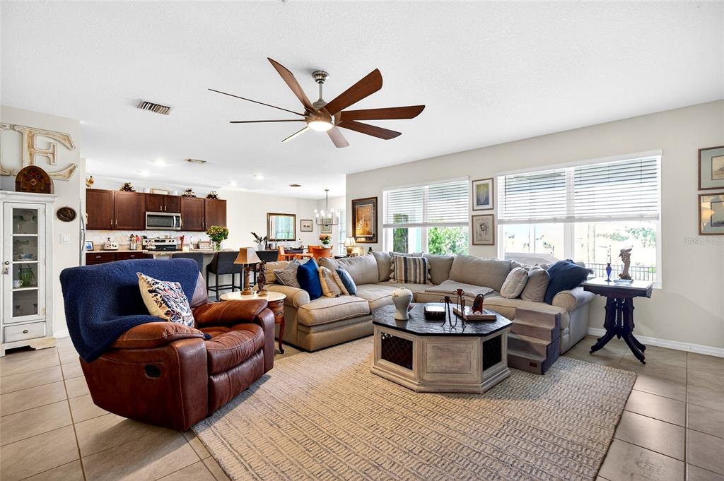 508 Hickory Course Loop Ocala, FL 34472 - Photo 23 of 40 a living room with furniture kitchen view and a window