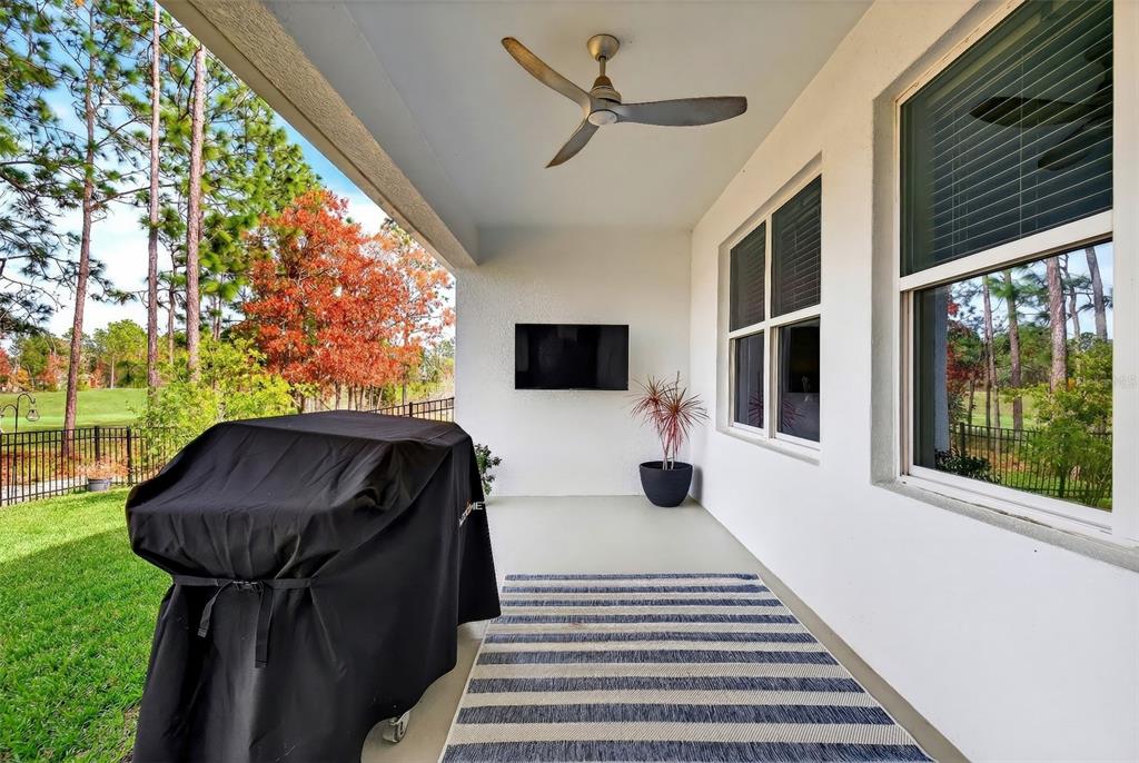 508 Hickory Course Loop Ocala, FL 34472 - Photo 37 of 40 a balcony view with a sink and a floor to ceiling window