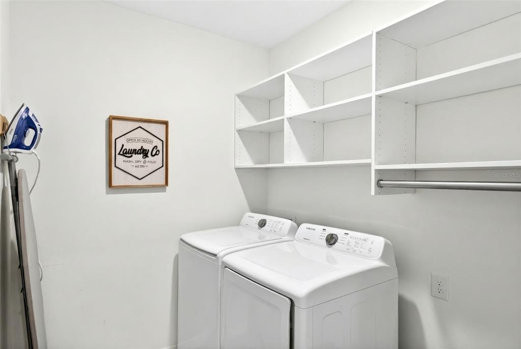 508 Hickory Course Loop Ocala, FL 34472 - Photo 8 of 40 a utility room with dryer and washer