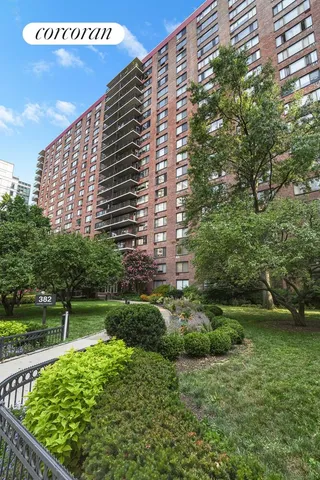 a view of a workspace with bookshelf
