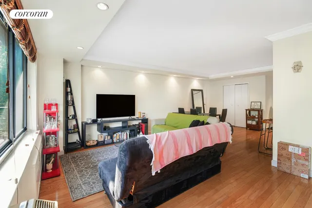 a picture of a bench in front of a building