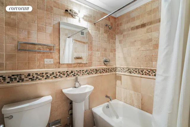a kitchen with granite countertop stainless steel appliances and wooden cabinets